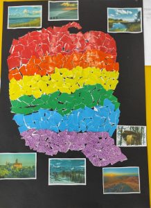 Praca plastyczna przedstawia wyklejoną na kolory tęczy mapę Polski.